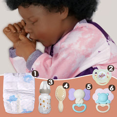 BABESIDE sleeping doll with eyes closed for gentle play.