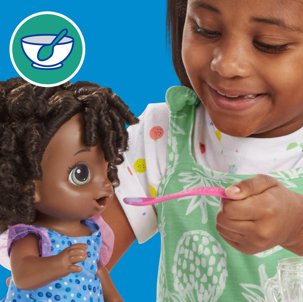Baby Alive doll fed with included spoon after blending.