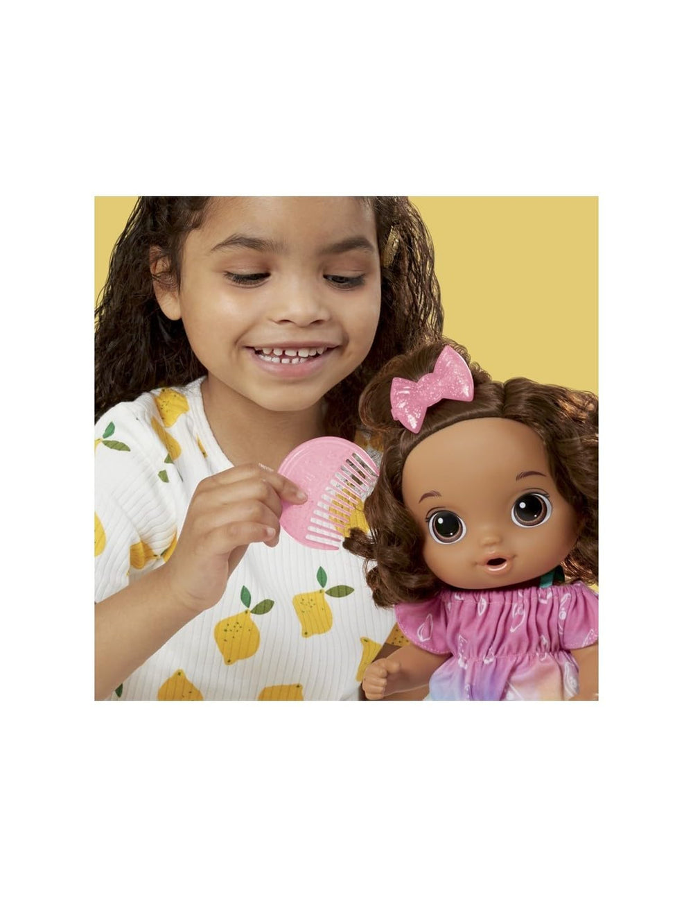 Baby Alive Fruity Sips comb and bow barrette for styling.