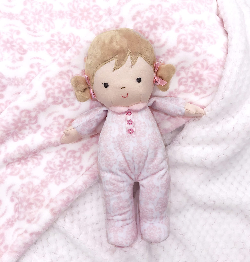 Brigitte safety-embroidered face on Baby Starters doll for tiny hands
