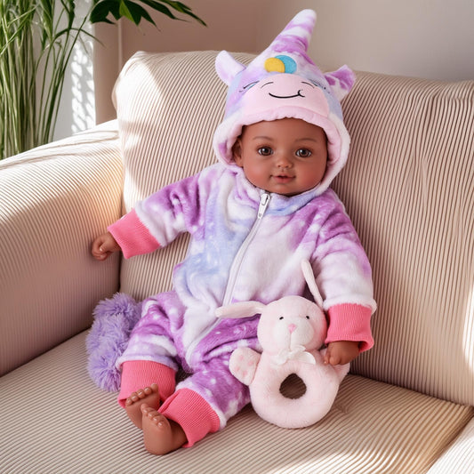 BABESIDE 15-inch black baby doll face with a warm smile for pretend play.
