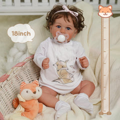 BABESIDE full-body doll seated, highlighting poseability for cuddles and storytelling