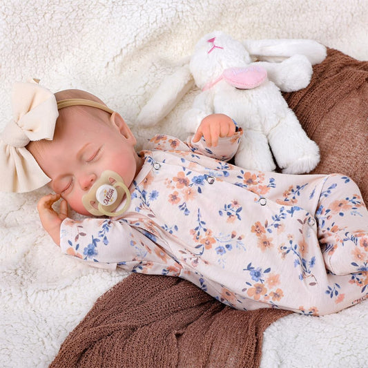 BABESIDE Reborn doll face close-up highlighting lifelike features for imaginative play.