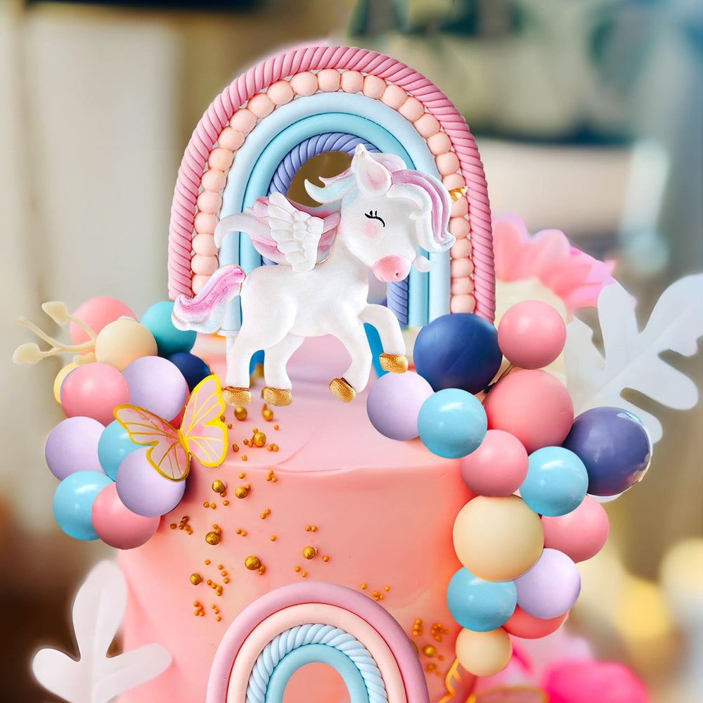 Bach and Boozy pink decorative balls create playful birthday accents.