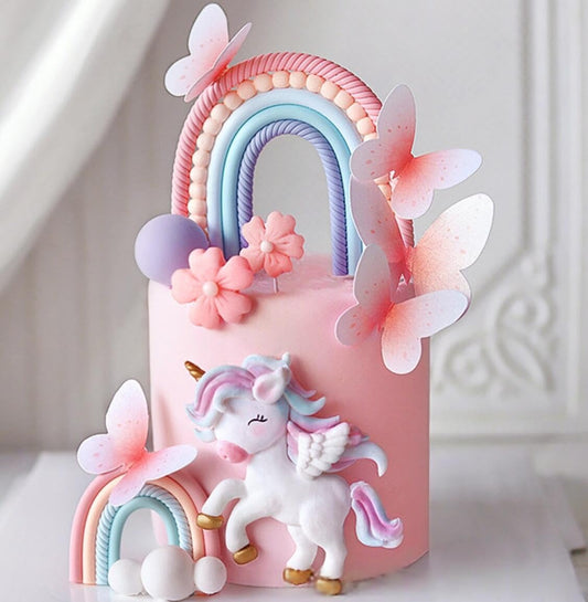 Bach and Boozy rainbow cake toppers brighten celebrations with pastel colors.