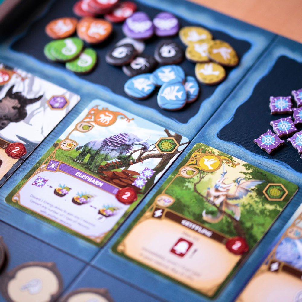 BAD COMET Wondrous Creatures habitat tiles organize ecosystems for strategic resource planning.
