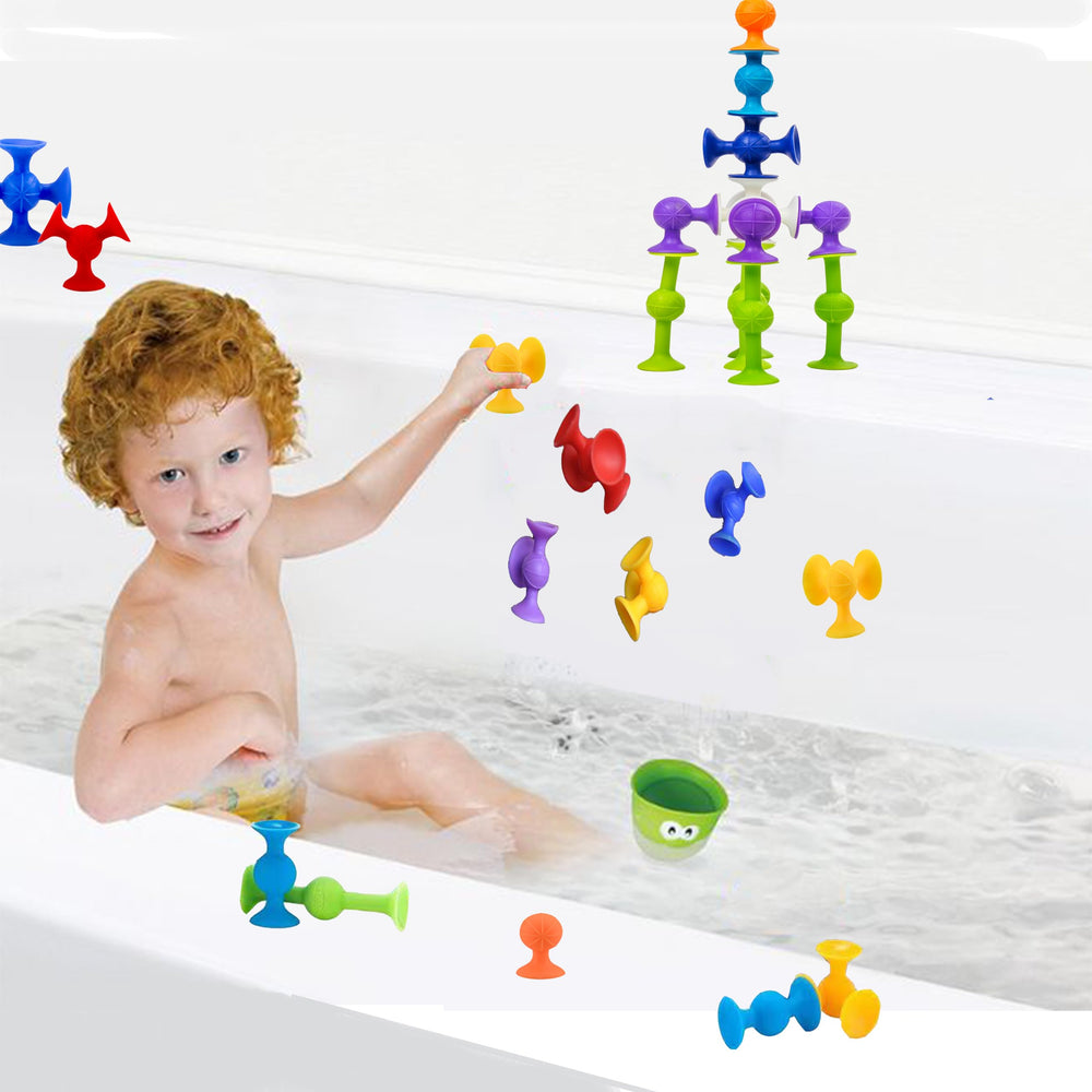 BAIVYLE suction cup pieces linking together to form new shapes.