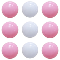 Cheerful pink and white balls add decorative playroom color.