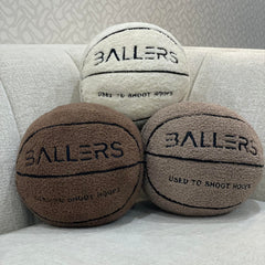 Ballers Plush Basketball Pillow doubles as sports decor for themed rooms