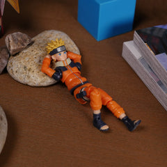 Various pose options for dynamic storytelling with the Naruto figure.