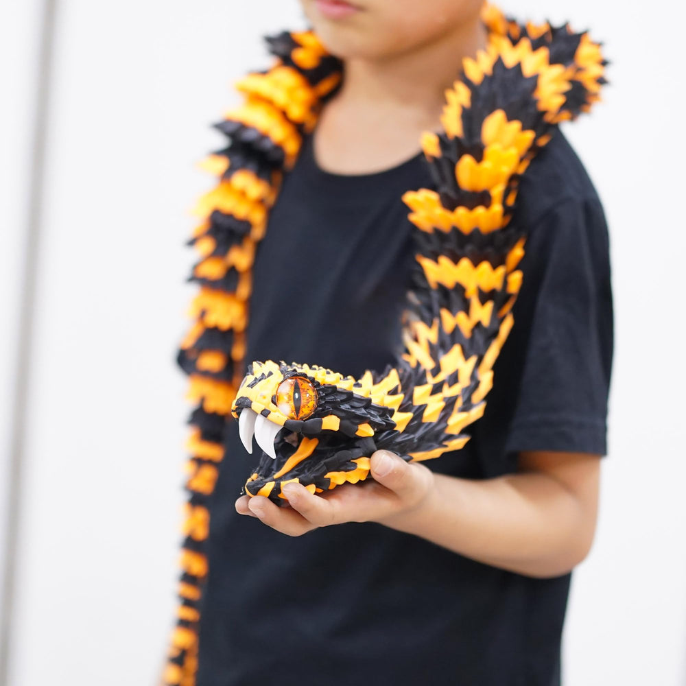 BANPIWOLG 47.5 inch snake model with movable teeth offers tactile desk engagement.
