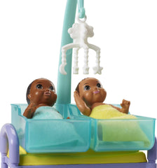 Barbie baby dolls wrapped in blankets invite comforting caretaking stories.