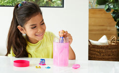 Barbie Chelsea Color Reveal tube water swirl creates color-change moment for interactive play