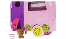 Barbie Chelsea doll seated in camper, ready for on-the-go adventures