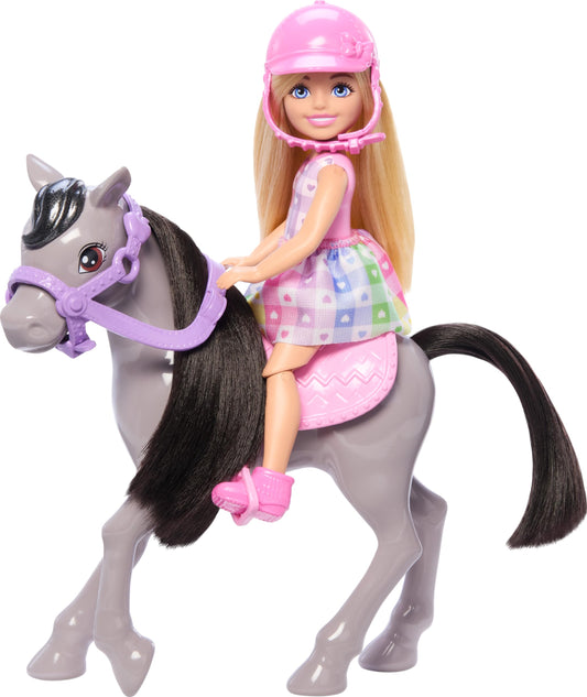 Barbie Chelsea doll wearing her pink helmet for safe, imaginative riding play.