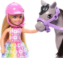 Barbie Chelsea doll with pink saddle ready for pretend trail adventures.