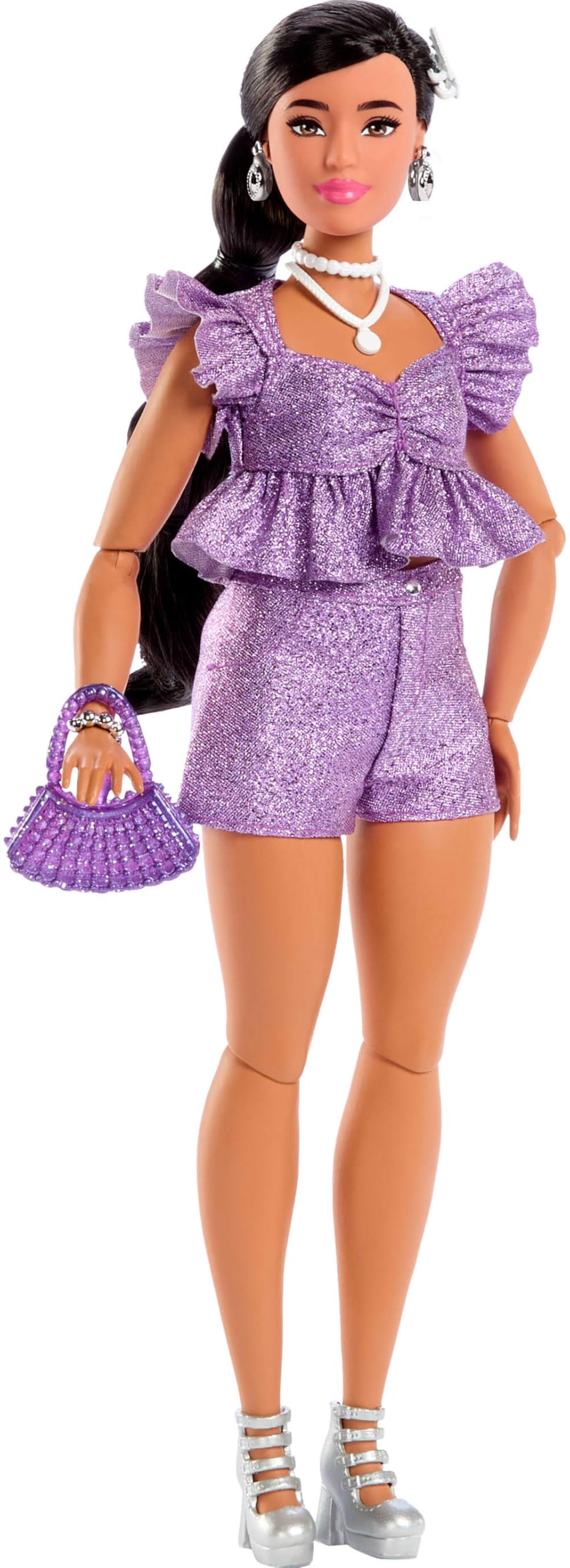 Barbie Deluxe Style Doll bendable joints support dynamic posing and storytelling.