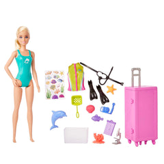 Barbie doll in snorkel gear invites exploration of life beneath the waves