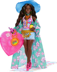 Barbie Extra Fly doll in beach-theme outfit for stylish travel storytelling.