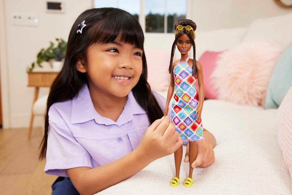 Barbie Fashionistas #210 gold circle sunglasses add instant sunny style.