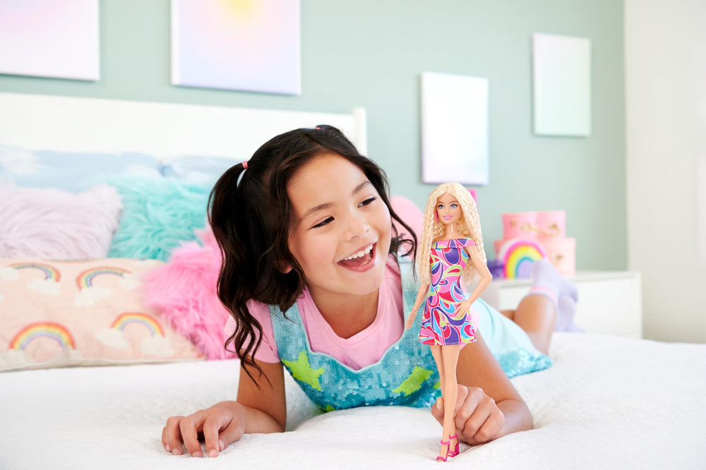 Barbie Fashionistas Totally Hair dress print shows vibrant styling possibilities.
