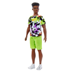 Ken in neon green shorts adds vibrant energy to playtime outfits.