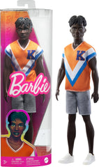 Barbie Ken Fashionistas with twisted hair in orange jersey for imaginative play.