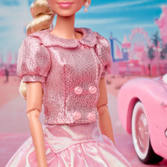 Barbie The Movie doll hairstyle with side twist shows film-inspired elegance.