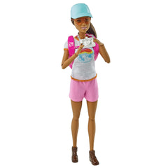 Barbie self-care doll with pink backpack and puppy on outdoor adventure.