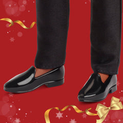 Ken features voluminous dark brown hair for a classic finish