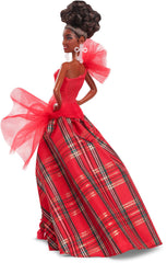 Barbie Signature Doll showcases gold nails and matching heels for a polished look.
