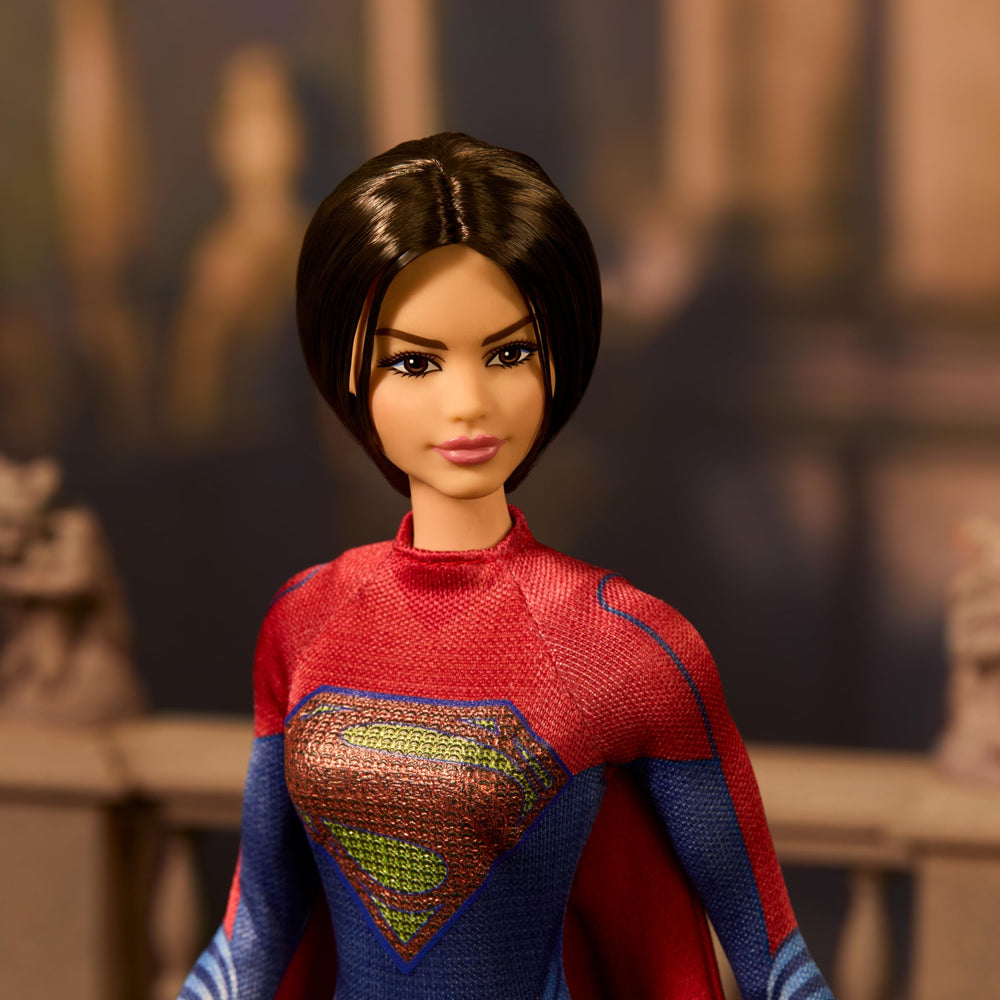 Barbie Supergirl cape flowing, ready for dramatic display.