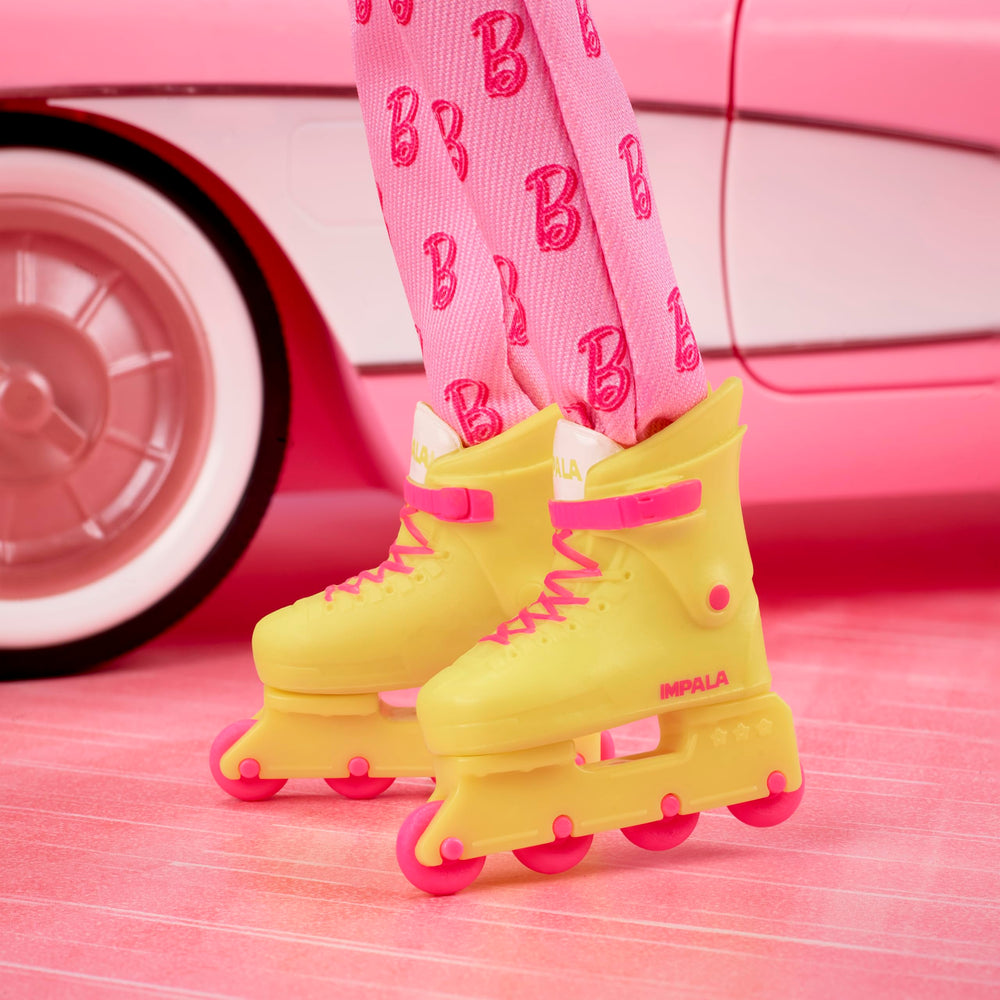 Barbie The Movie Ken posable figure offers versatile display possibilities.