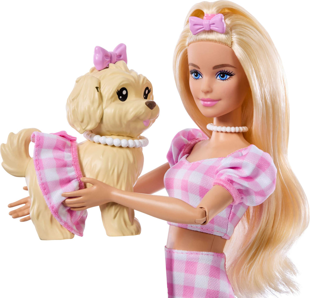 Puppy with bow and ruffle skirt enhances twin-story play.