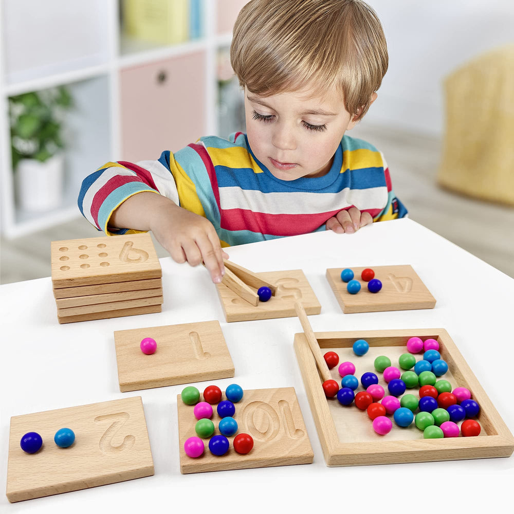 BBtinker left-side tracing guides forming numeral shapes for recognition.