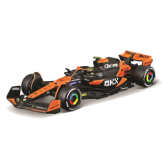 Bburago McLaren MCL38 1:43 die-cast model with helmet, ideal display piece for collectors.