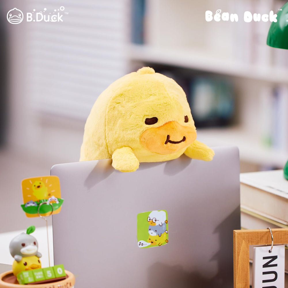 Bedside setup with Bean Duck adding cozy ambiance to night routine.