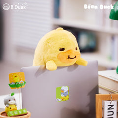 Bedside setup with Bean Duck adding cozy ambiance to night routine.