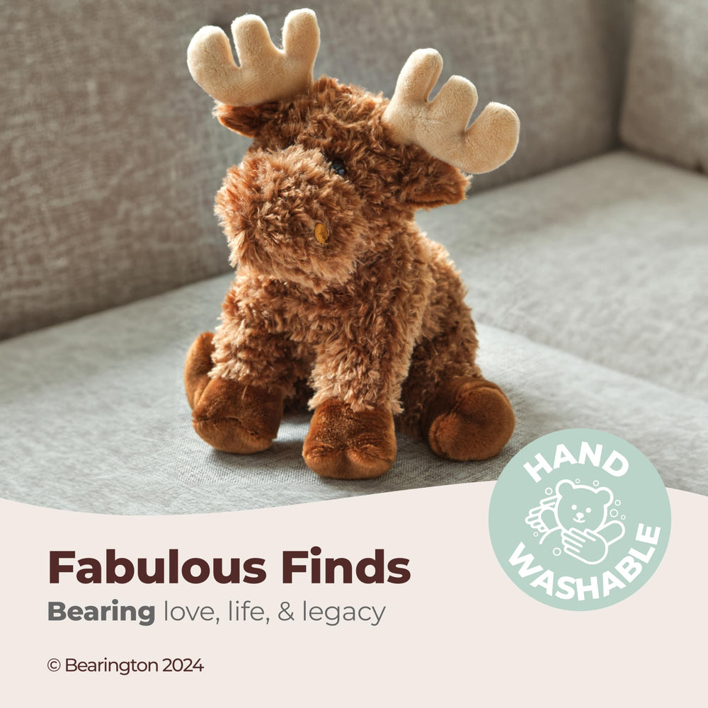 Morton Moose cuddling with a child, showcasing comforting hug
