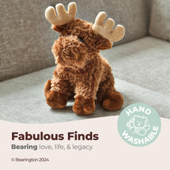 Morton Moose cuddling with a child, showcasing comforting hug