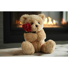 Bearington Remington teddy bear in a cuddle pose, inviting snuggles for kids and partners.