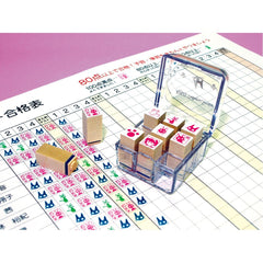 Beverly mini stamps on notebook or calendar for quick checks.