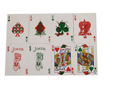 Bicycle Green Back Red Santa front spread highlights vibrant holiday design.