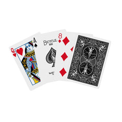 Magic tricks setup featuring Bicycle deck for sleight-of-hand
