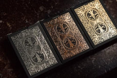 Bicycle Metalluxe foil-detail close-up on black cards.