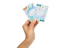 Bidson Games Poof Game player hands showing easy-to-learn gameplay.