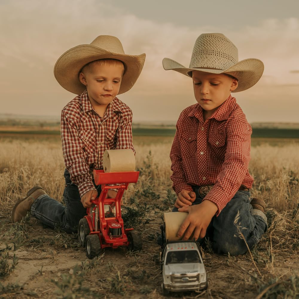 Big Country Toys interchangeable bucket and hay fork attachments.