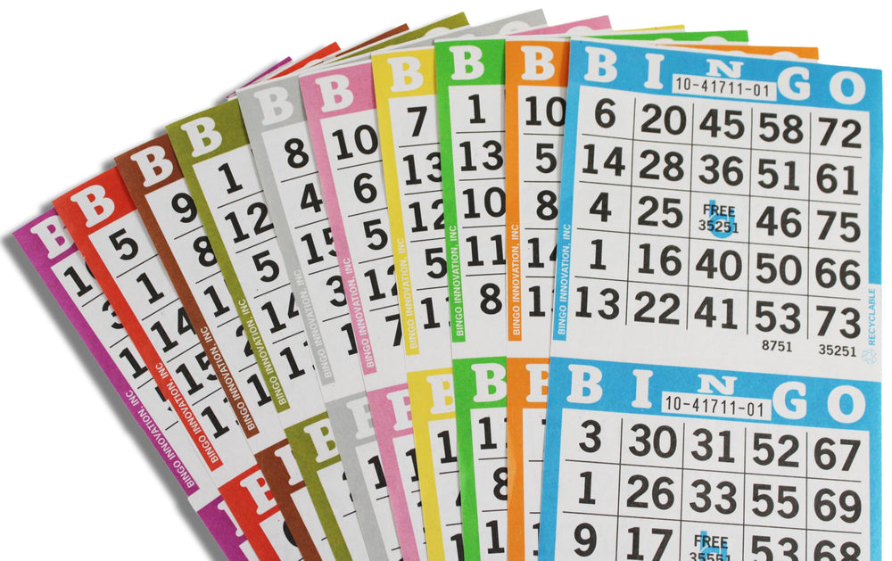 Seniors enjoy a fundraiser session with Bingo Books at a community table