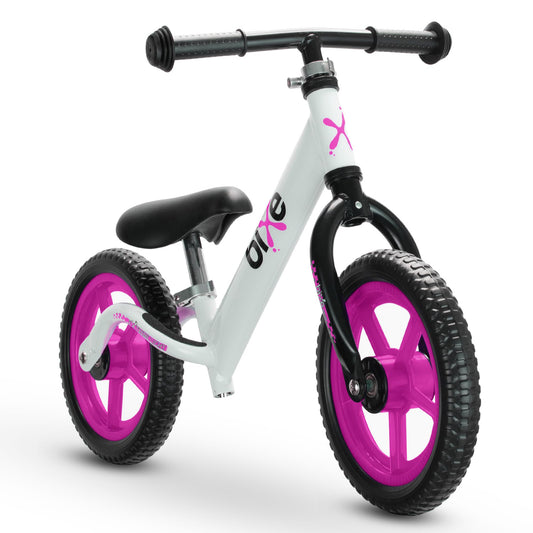 Bixe pink front view balance bike shows a lightweight frame for easy steering.