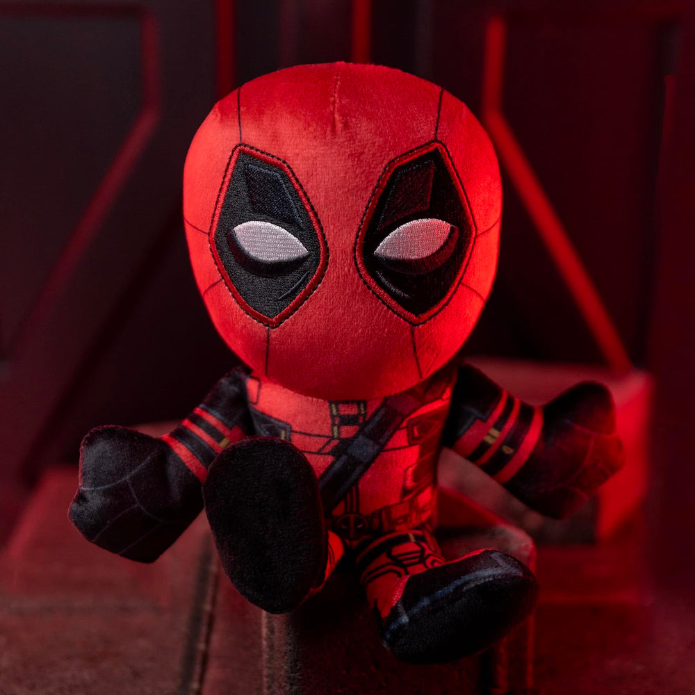Bleacher Creatures Deadpool plush display-ready on shelf and desk.